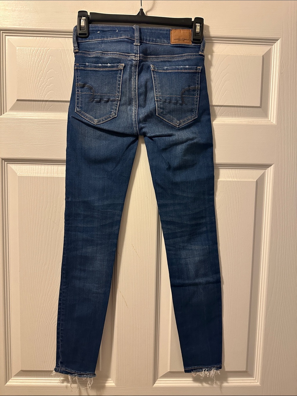 American Eagle Outfitters Dark Blue Jegging Jeans w/Frayed Hem - Size 00 Short